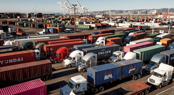 MR Online | Trucks line up to enter a Port of Oakland shipping terminal on Wednesday Nov 10 2021 in Oakland California AP PhotoNoah Berger | MR Online